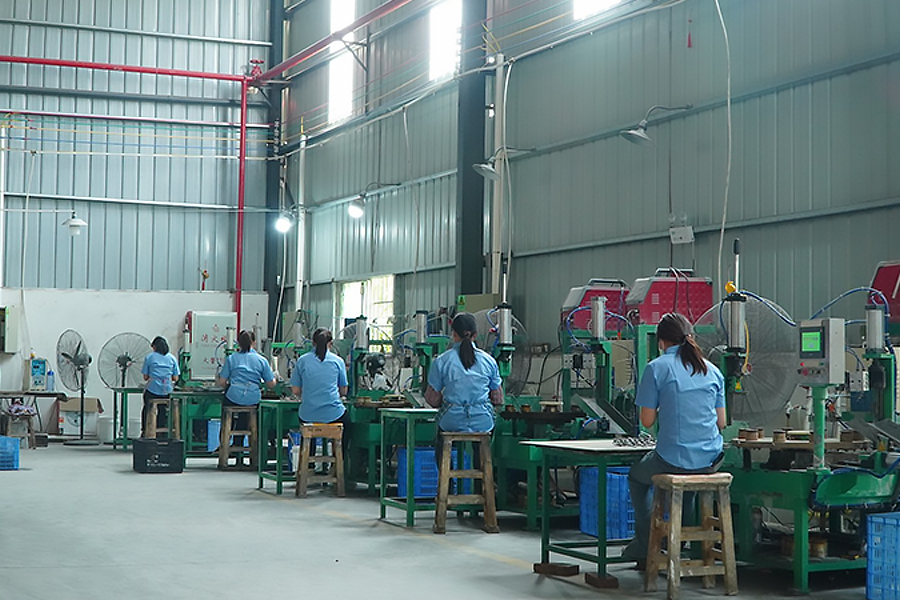 Image of the production workshop at Zhongshan Yuekon Electrical Appliances Co., Limited, showcasing the manufacturing process and assembly line for Tea Maker Kettles and Electric Kettles.